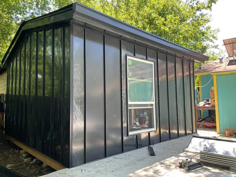 Black standing seam metal wall panels for Metal Roof Installation in East Hampton