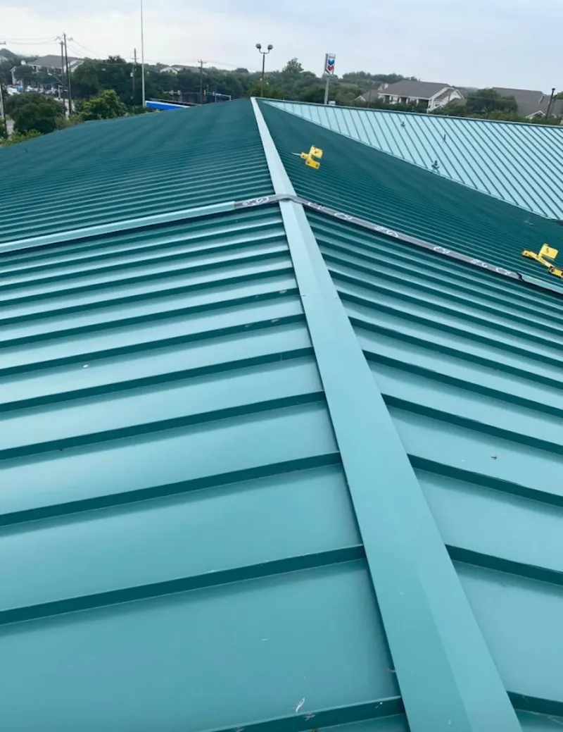 Green commercial metal roof ridge and valley for Metal Roof Repair in East Hampton